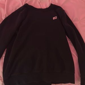 A black North-face crewneck